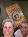 Here we are in the saloon at Silver Dollar City. Don't believe the poster behind us, or should you?